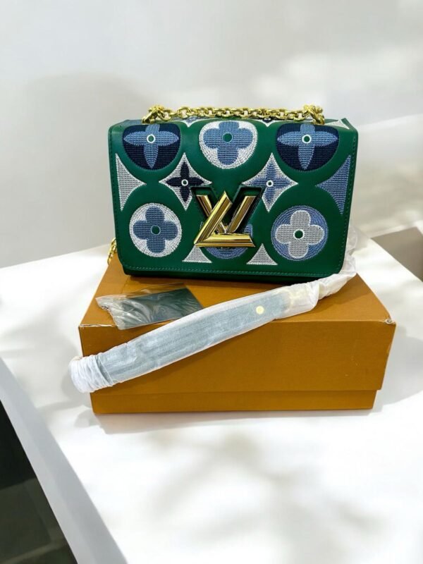 LOUIS VUITTON TWIST SLING BAG