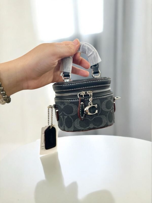 COACH TRAIL SLING BAG